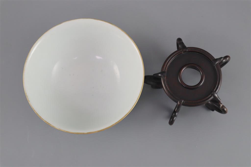 A Chinese enamelled landscape porcelain bowl, Jiaqing mark and of the period (1796-1820), 15.5cm diameter, wood stand